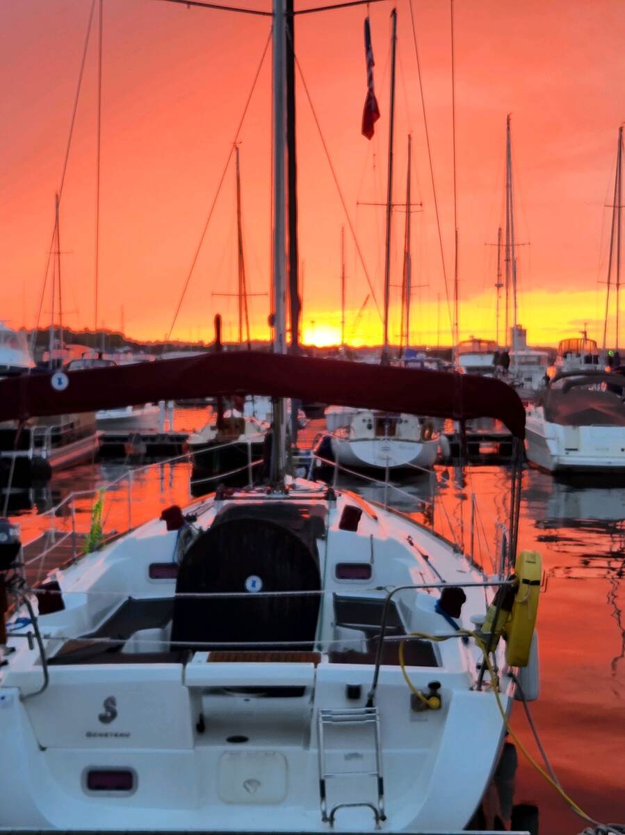 Alouette in the marina at sunset