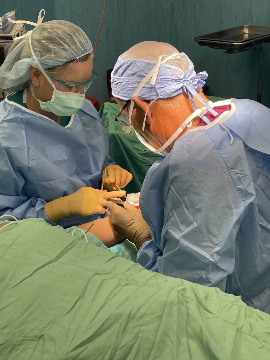 Nicholas Maxwell operating in Nicaragua with his wife serving as surgical assistant