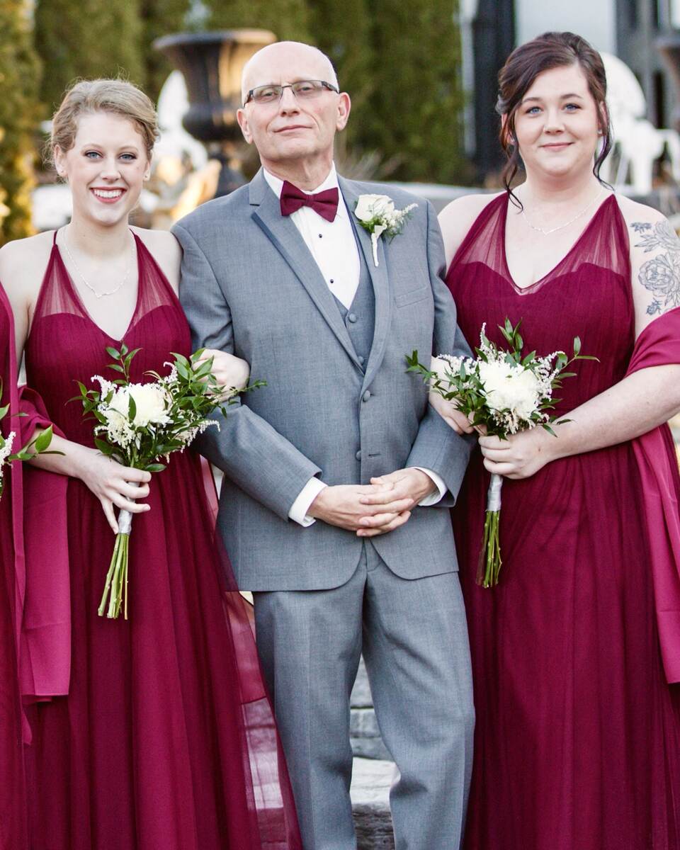 Nicholas Maxwell with his daughters